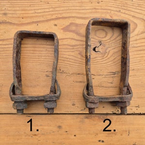 Horse yoke parts, rusted metal items from horse carriage