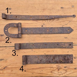Rusty hinges, large barn and window hinges