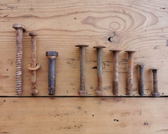 Large rusted screws, huge rusty bolts