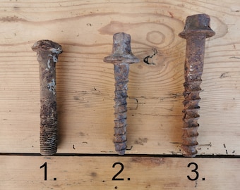 Old railroad bolt, rusted screws, rusty lag bolts