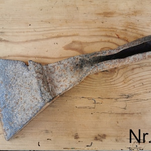 Rusty axe head, rusted, old hatchet