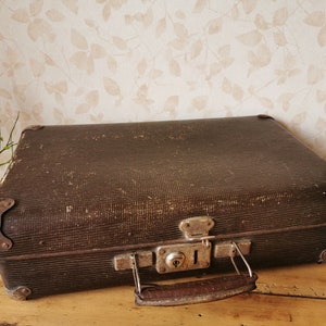 Vintage cardboard suitcase, old storage box with lid