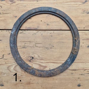 Rusty metal ring, rusted circle, old industrial parts