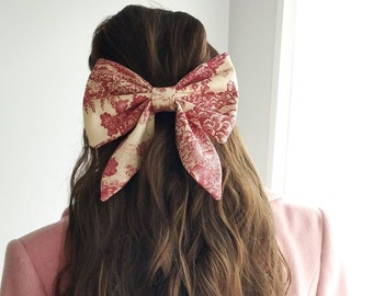 Barrette nœud bijou cheveux en toile de Jouy rouge