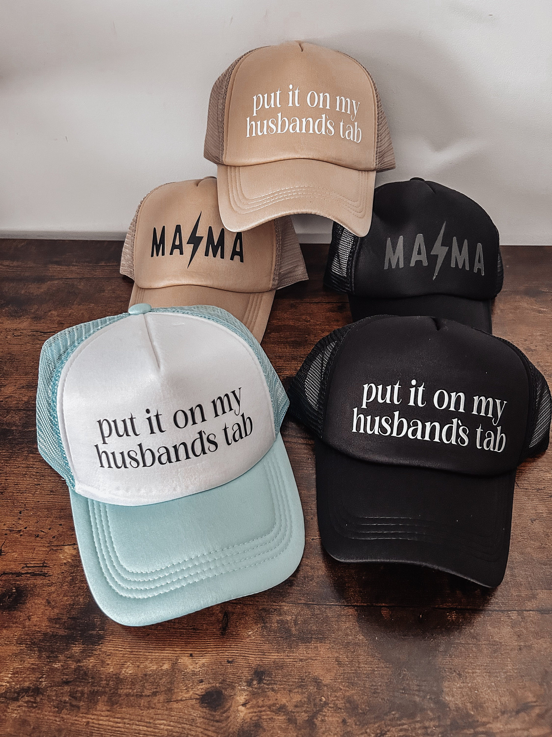Put It On My Husbands Tab Trucker Hat Put It On My Husbands Tab Trucker Hat