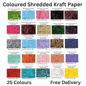 May include: A display of 25 coloured shredded kraft paper samples in various shades. The colours range from green and blue to pink, black, and burgundy. Each sample is labelled with its colour name. The text reads "25 Colours".