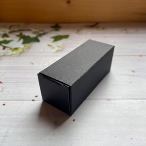 Caja de regalo plana de papel kraft negro de 7,5 cm x 3 cm x 3 cm, caja de cartón pequeña, caja de cerillas, mini caja de regalo