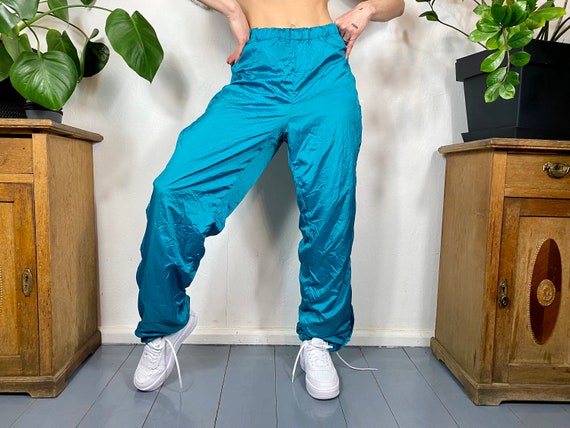 Adidas turquoise track pants hotsell