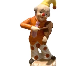 Figura de payaso vagabundo vintage de 15 cm, instrumento musical de porcelana, de los años 70, fabricada en Corea.