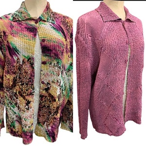 May include: Two button-down shirts on a mannequin. One is a vibrant mix of colors including pink, green, yellow, and brown. The other is a solid pink with a textured diamond pattern.