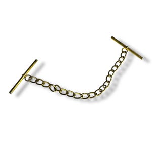 May include: A gold-colored tie chain with a chain link design. The chain connects two horizontal bars, creating a classic accessory. The chain is designed to keep a tie in place.