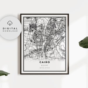 Może przedstawiać: Czarno-biała mapa do wydrukowania Kairu w Egipcie. Mapa przedstawia ulice i punkty orientacyjne miasta. Tekst "Kair, Egipt 30°02'N | 31°14'E" jest wydrukowany pod mapą.