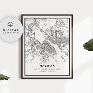 May include: A black and white map print of Halifax, Nova Scotia, Canada. The map shows the city's streets and waterways. The text "HALIFAX", "NOVA SCOTIA CANADA", and "44°38′52°N | 63°34′17 W" is printed below the map.