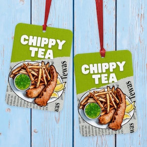 May include: Two green and white rectangular signs with the text "Chippy Tea" in white. Each sign features a cartoon illustration of a plate of fish and chips with peas and lemon wedges.