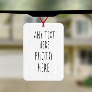 May include: White car air freshener with black text that reads "ANY TEXT HERE PHOTO HERE".