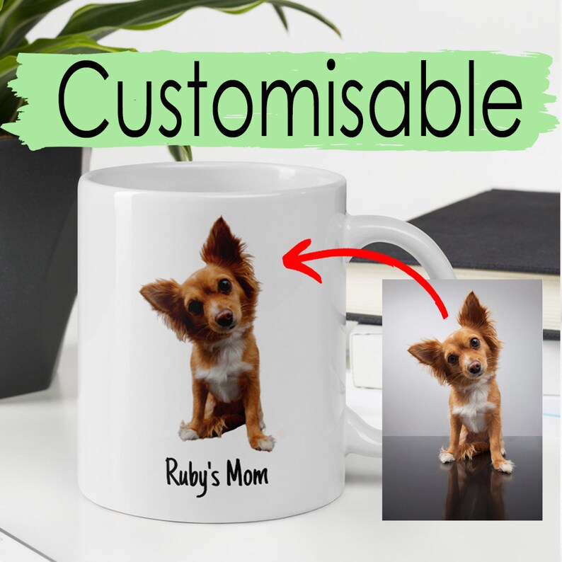 May include: White ceramic mug featuring a brown and white dog image and the text "Ruby's Mom". The mug can be personalised with a different image.