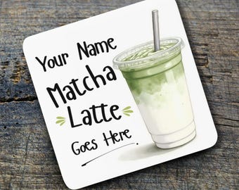 May include: Square coaster with a matcha latte design. The drink is in a clear plastic cup with a straw. The coaster has rounded corners and text that reads "Your Name Matcha Latte Goes Here."
