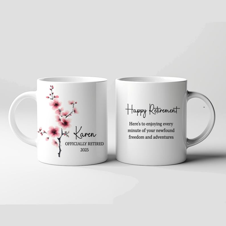 May include: Two white ceramic mugs. One mug features a floral design with pink blossoms and the name "Karen" with "OFFICIALLY RETIRED 2025." The other mug has the text "Happy Retirement" and a message about enjoying freedom.