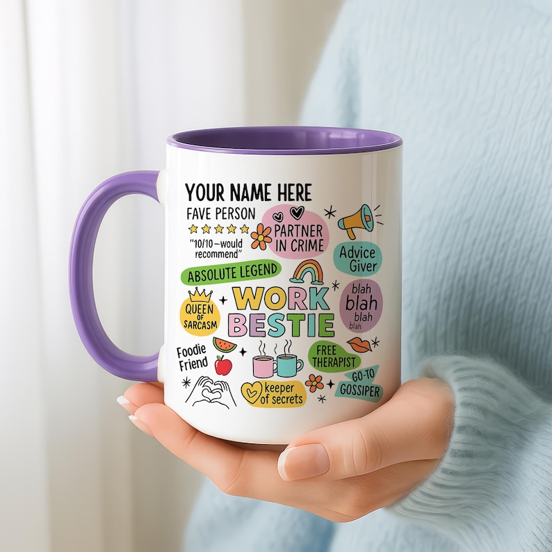 May include: White ceramic mug with a purple interior and handle. The mug features the text "YOUR NAME HERE" and "WORK BESTIE" with various icons and phrases like "FAVE PERSON" and "FREE THERAPIST".