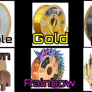 May include: A collection of 3D printing filament spools in various colors, including marble, gold, gunmetal, brown, rainbow, and silk black gold. Each spool is labeled with its respective color name. A 3D printed castle and hippo are also visible.
