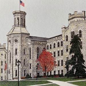 May include: A detailed illustration of a large, stone building with a central tower and an American flag flying from the top. The building has many windows and a symmetrical design. There are trees and a walkway in front of the building.