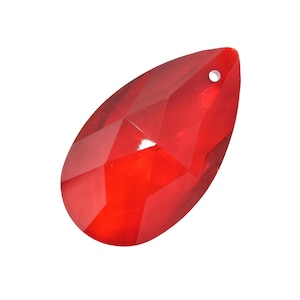 May include: A red teardrop-shaped crystal with a faceted design. The crystal has a small hole at the top for hanging.