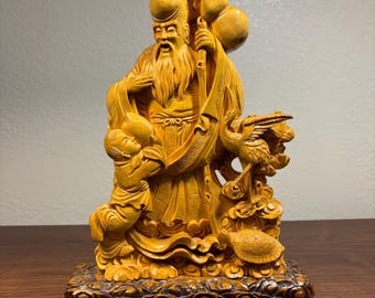 19 世紀の石鹸石彫刻、中国の長寿の神である寿老が杖と桃の像を持って