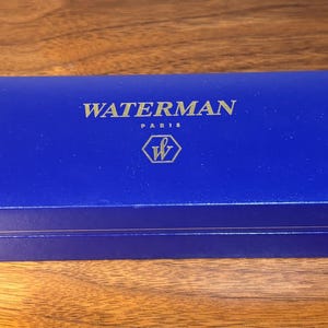 Set completo con penna stilografica Waterman Expert II, laccata nera e finiture dorate. immagine 7
