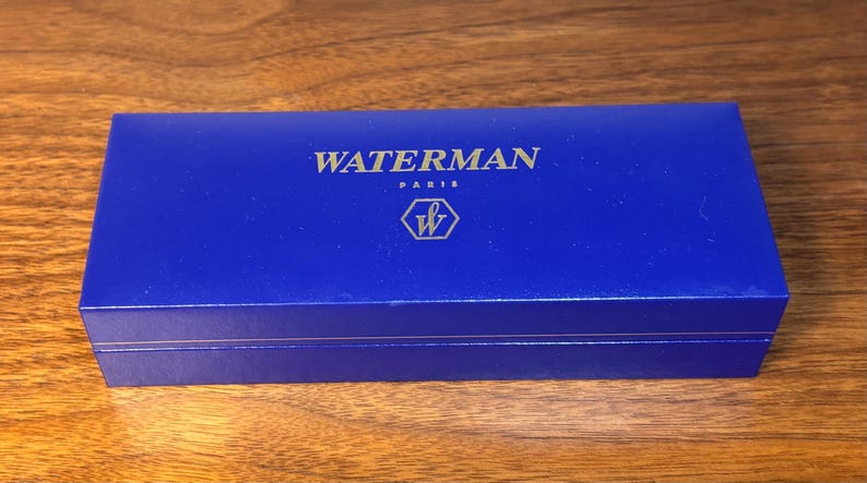 Set completo con penna stilografica Waterman Expert II, laccata nera e finiture dorate. immagine 7