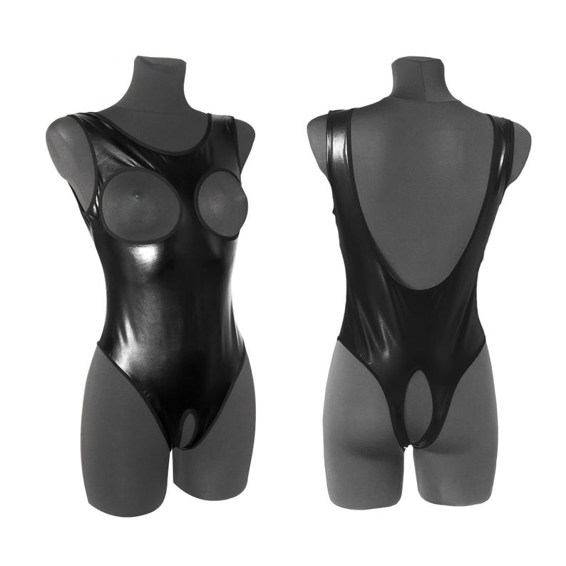 May include: Black shiny bodysuit with a cut-out design in the front and back. The bodysuit is on a mannequin.
