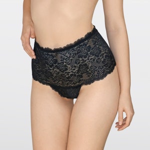 May include: Black lace underwear with a floral pattern.