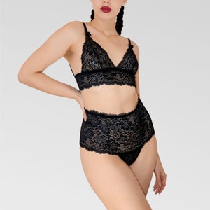 May include: Black lace lingerie set with a triangle bra and high-waisted briefs.