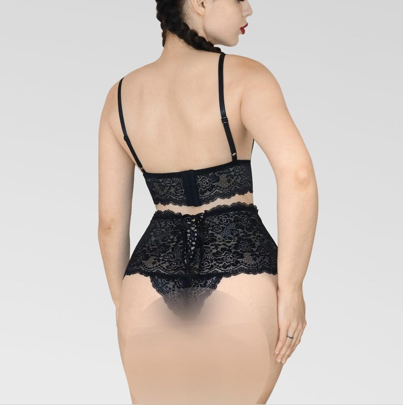 May include: Black lace lingerie set with a bralette and high-waisted bottoms.