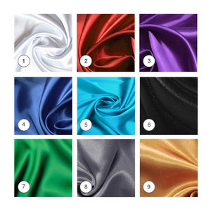 May include: Nine fabric swatches in different colors and textures. The swatches are arranged in a grid of three rows and three columns. The colors are white, red, purple, blue, turquoise, black, green, gray, and gold.