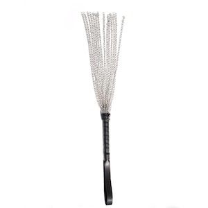 May include: A black leather-handled whip with multiple silver chains.