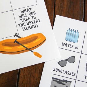 Closeup photo of printed out raft page and item sheet laying on table.