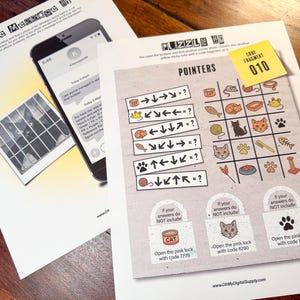 May include: Printed puzzle sheets with the text "Phone Message" and "Puzzle HQ." One sheet shows a phone with a text message. The other sheet has a grid with cat-themed icons and arrows, plus a yellow sticky note with "010."