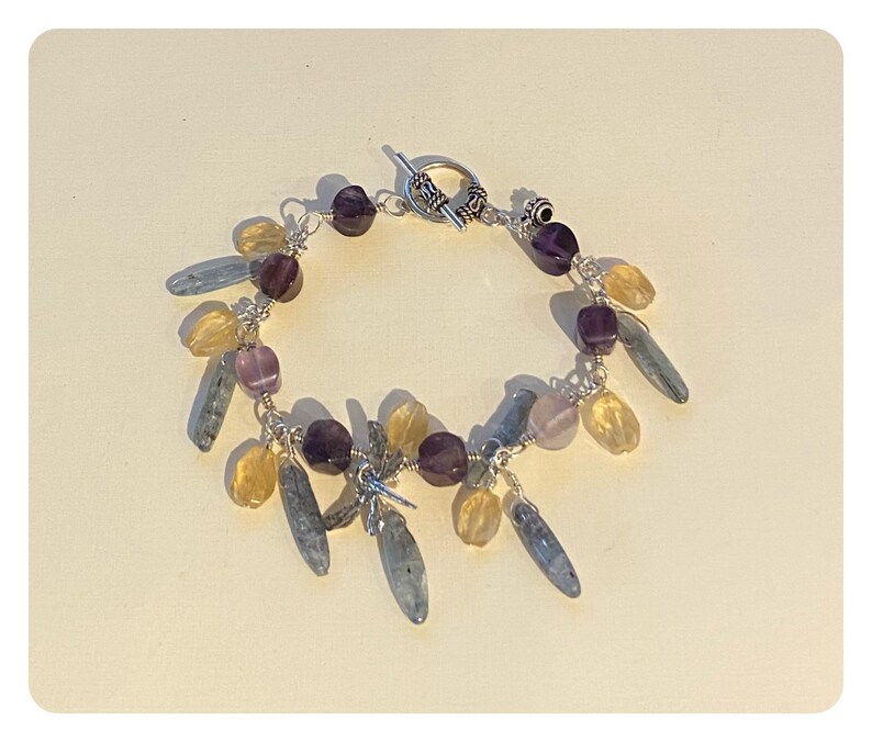 *kyanite* and *citrine* bracelet. Amethyst*