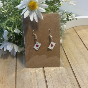 Orecchini con carta asso