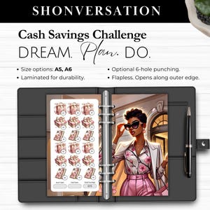 May include: A black planner with a "Cash Savings Challenge" theme. The planner includes a page with gift box and phone graphics, and a page with an illustration of a woman in sunglasses. The text "DREAM. Plan. DO." is visible.