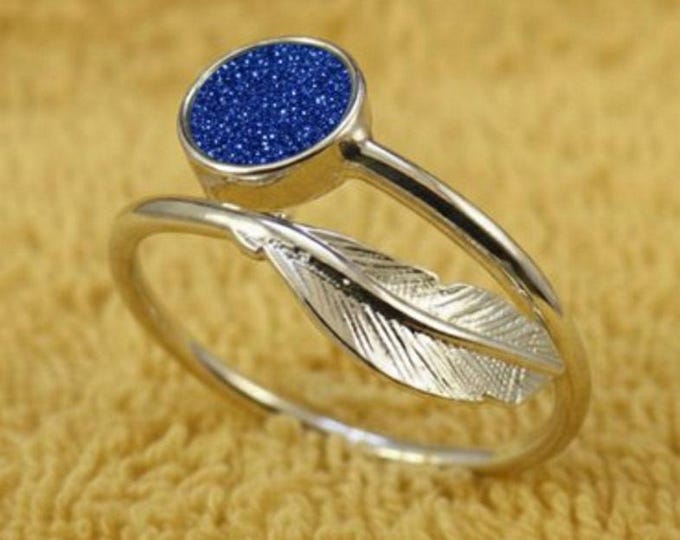 Personalised Sterling Silver Feather Adjustable Ring with a 6mm Setting including Ashes or Hair Inlaid With Blue Eco-Glitter