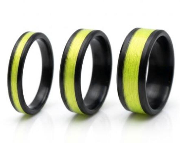 Yellow fishing Line Black Ceramic ring inlaid with Genuine Yellow  fishing Line - UV Glow Ring 4 mm, 6 mm or 8 mm wide ring.