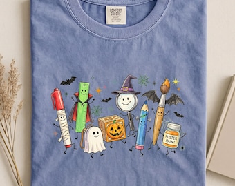 Spooky School Supplies Shirt, Comfort Colors Fall Teacher Tee, Smiling Ghost Backpack Shirt, Spooky Educator Gift, Halloween Teacher Tee