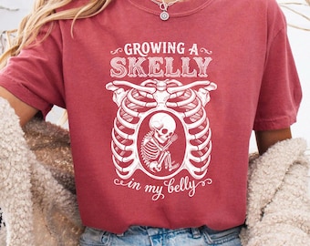 Growing A Skelly In My Belly Shirt, Comfort Colors Maternity Tee, Skeleton Baby Announcement Shirt, Spooky Season New Mom To Be Gift