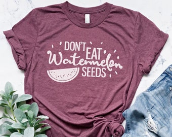 Camiseta de anuncio de embarazo "No comas semillas de sandía"