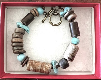 Handcrafted Crinoid Fossils With Turquoise Bracelet