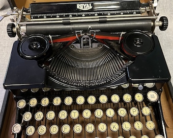 Máquina de escribir portátil Royal de 1930 vintage en caja