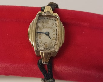 Zwart Bulova-dameshorloge uit de jaren 40