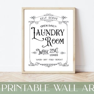 May include: A printable wall art sign with a vintage design. The sign reads "Self Serve - Open Daily. Laundry Room With 25p Loads Wash - Dry - Fold - Repeat".