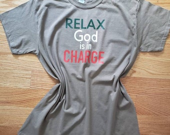 Relax God in in charge tshirt